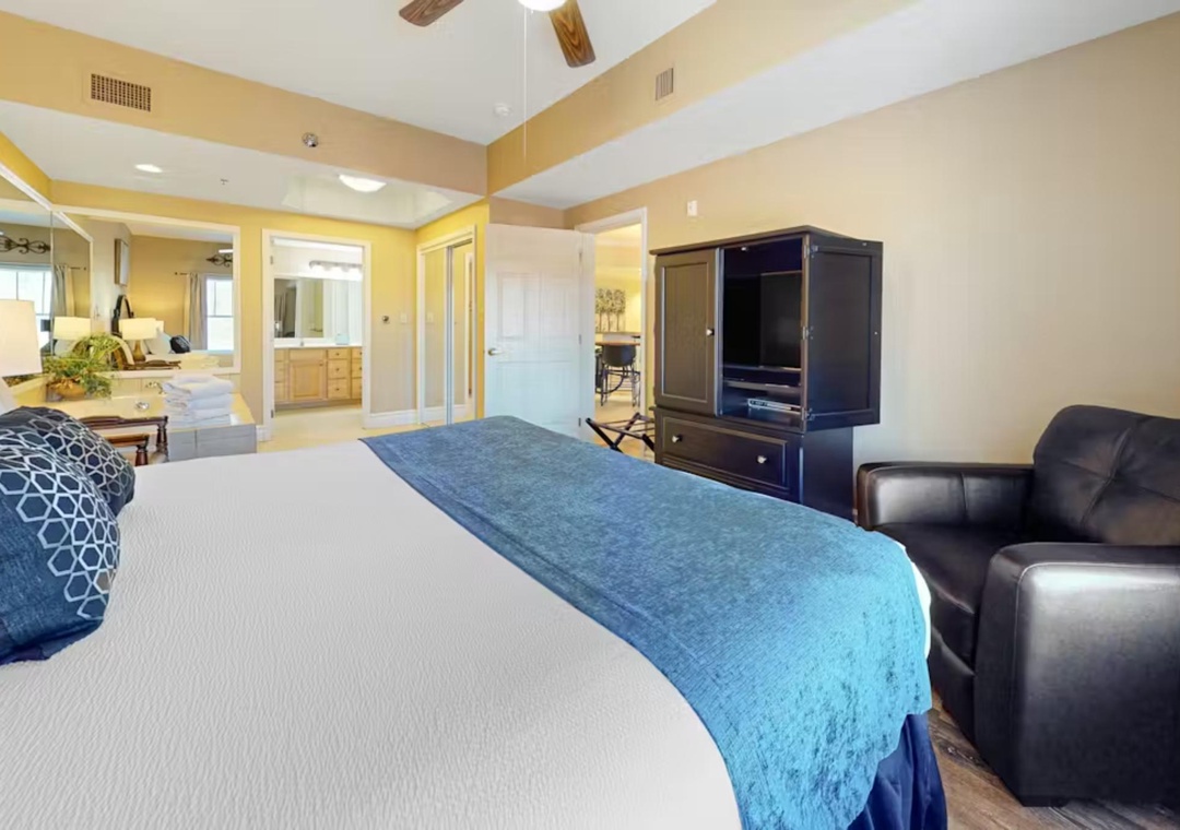 Unwind in your spacious master suite with plush bedding, leather seating, and entertainment center—your perfect retreat after days of adventure.