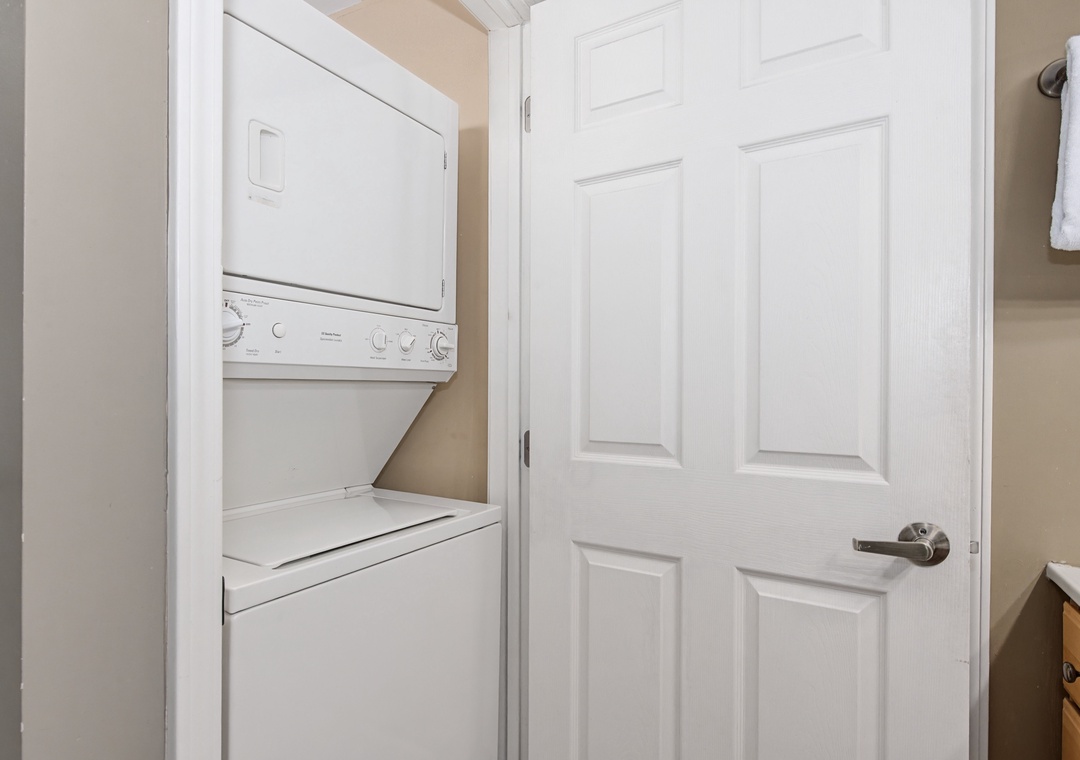 Your own in-unit washer and dryer await behind this convenient closet door, making longer stays effortless and comfortable.