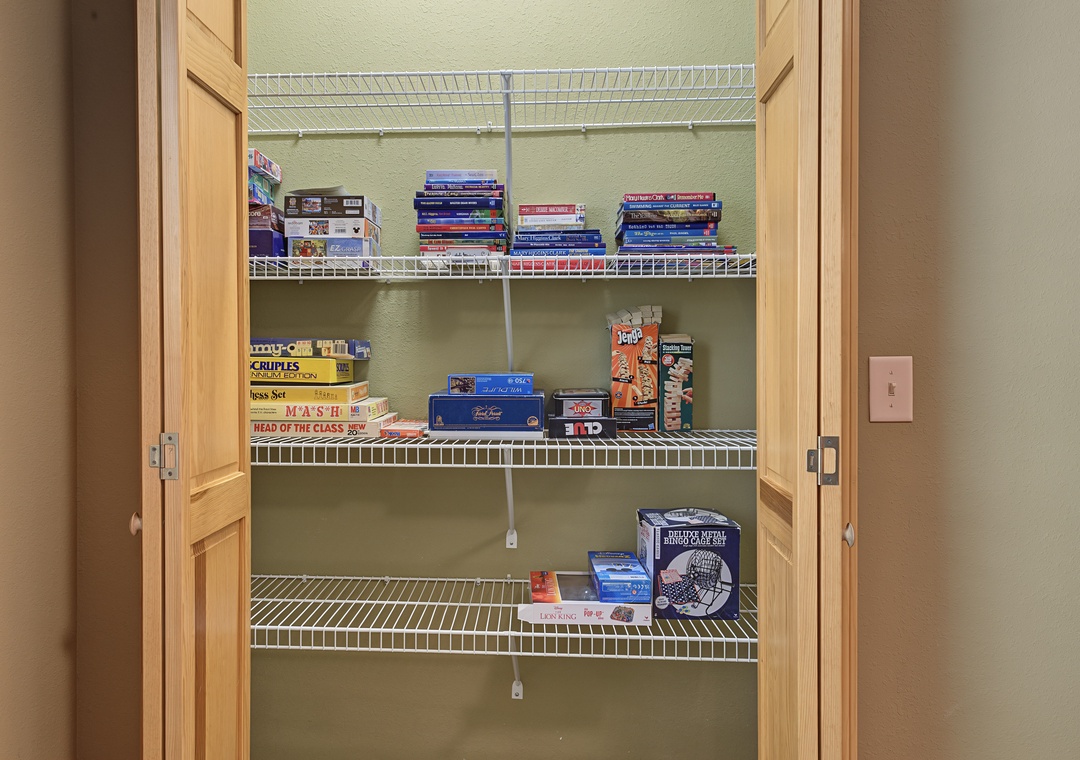 A closet stocked with board games and puzzles gives you endless options for cozy nights in, making every evening feel like a game night at home.