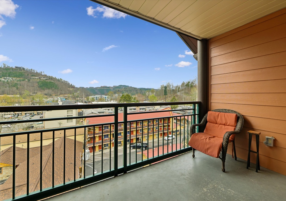 Relax in your comfortable balcony chair while soaking in stunning mountain views and fresh air.