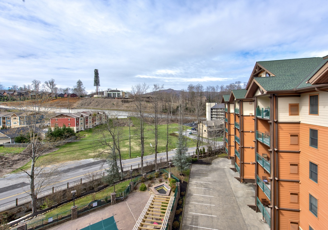 Modern mountain-style buildings offer convenient access to local attractions and scenic surroundings in this developing area.