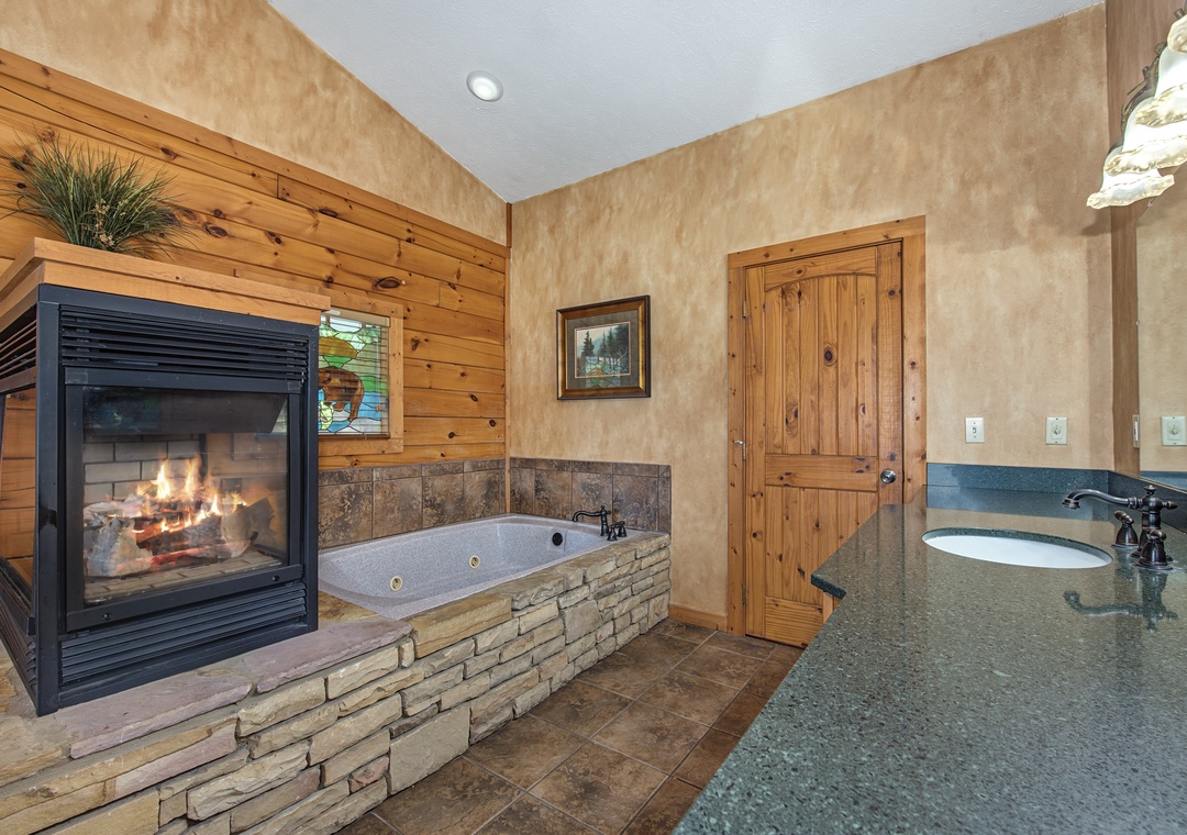 Warm up by the crackling fireplace as you sink into your private jetted tub—your perfect mountain retreat after a day of adventure.