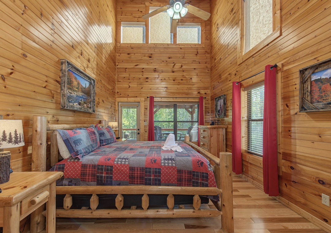 Drift off to sleep in your cozy log cabin bedroom, surrounded by rustic wood walls and soft plaid bedding.