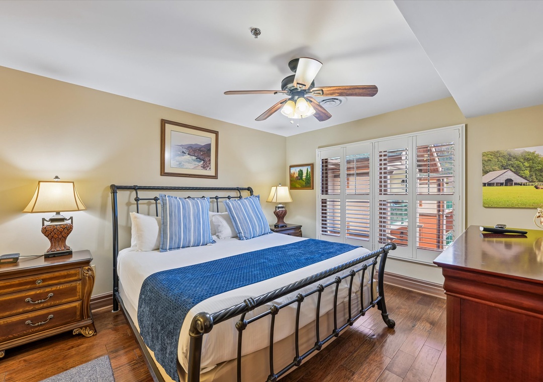 Sink into your cozy retreat with crisp linens, warm wood floors, and gentle ceiling fan breezes for the perfect night's rest.