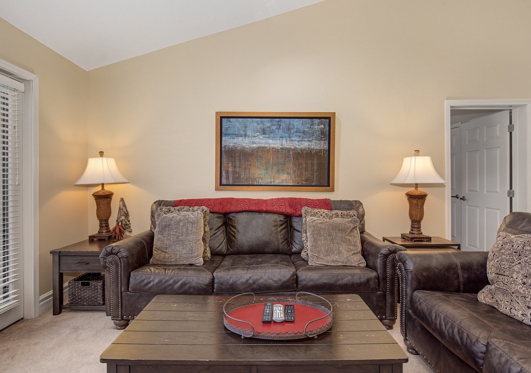 Sink into plush leather seating surrounded by warm lighting and thoughtful touches that make your vacation feel like home.