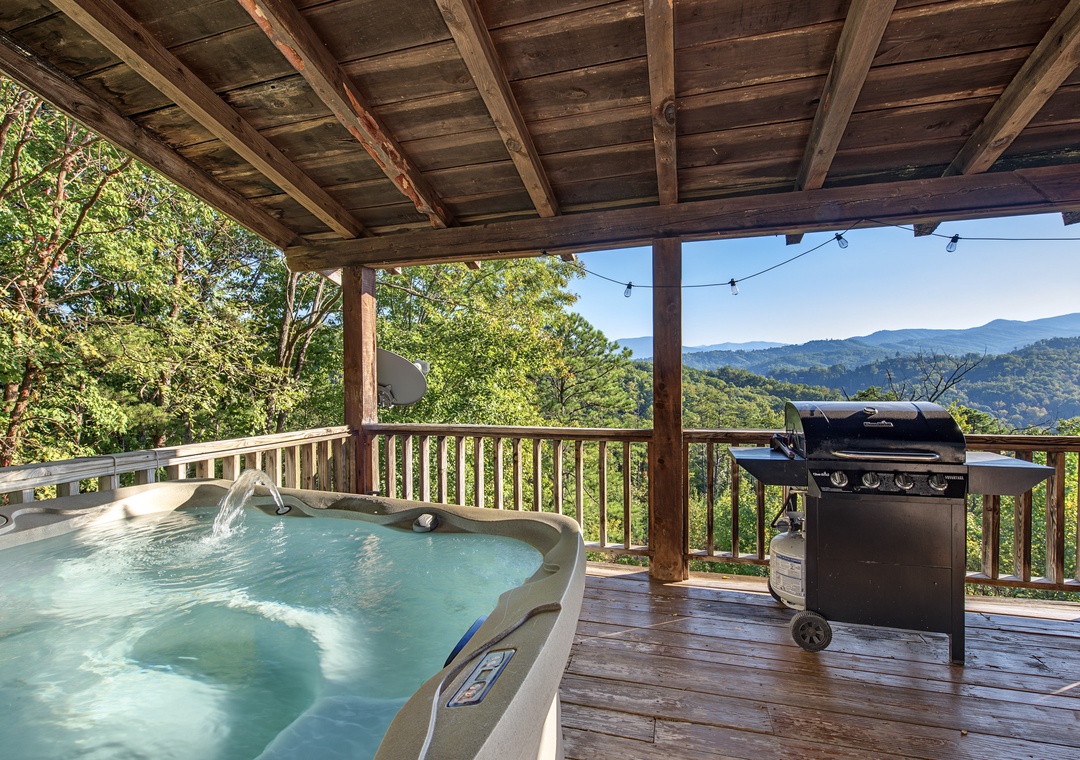 Soak in your private hot tub while gazing at stunning mountain vistas. Fire up the grill for an outdoor feast under string lights, all from this covered deck retreat.