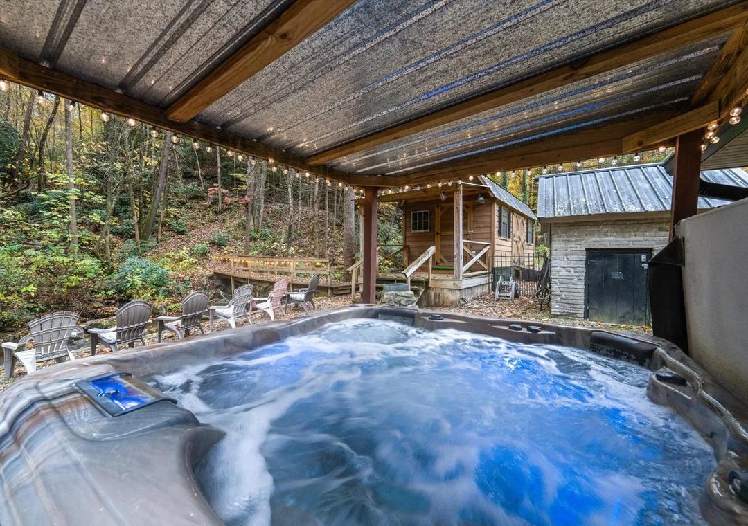 Slip into the bubbling hot tub under twinkling lights, surrounded by peaceful woodland views. Perfect for unwinding after exploring the natural beauty around you.