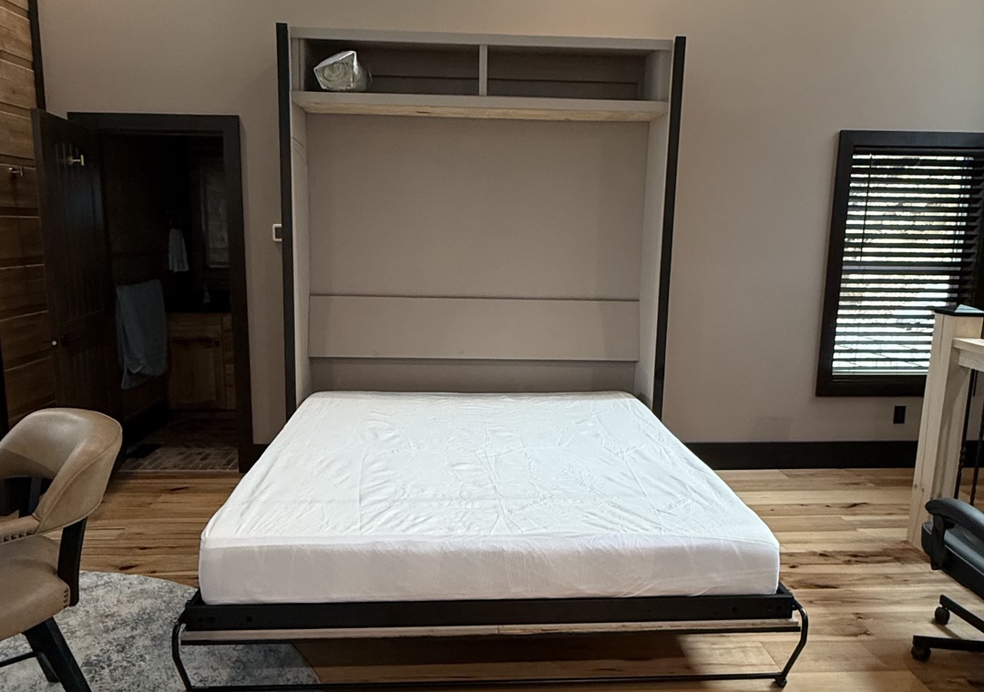 Your space-saving Murphy bed easily folds into this stylish wall unit, giving you a cozy bedroom by night and open living area by day.