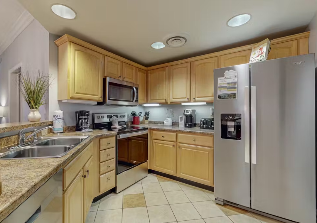 Your fully equipped kitchen awaits with granite counters, stainless appliances, and everything you need to create delicious meals during your stay.