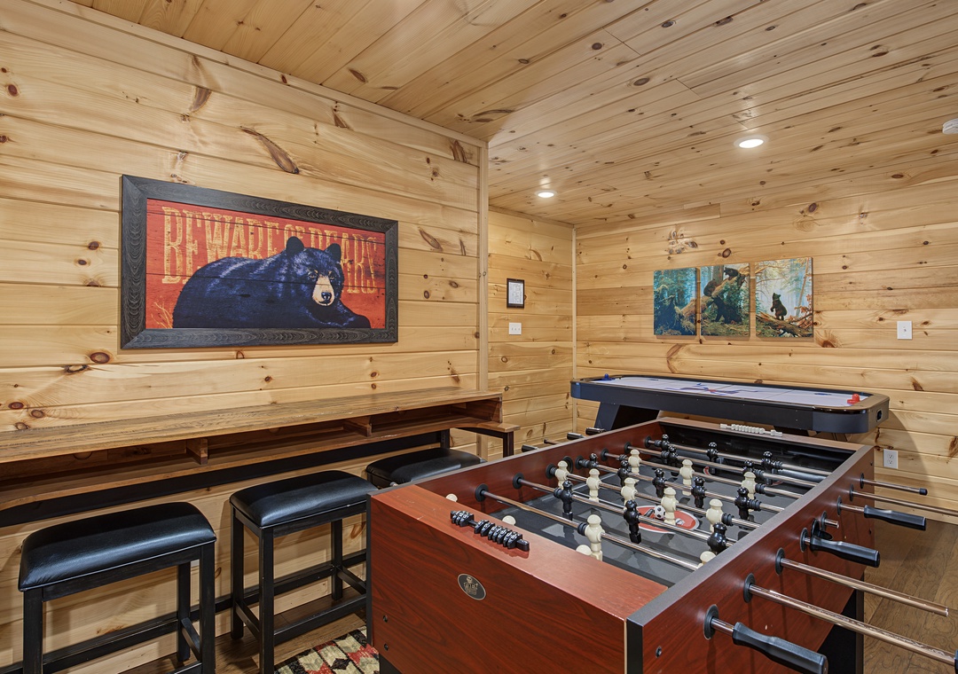 Step into your own private game room with foosball, air hockey, and high-top seating—perfect for friendly competition and making memories with your crew.