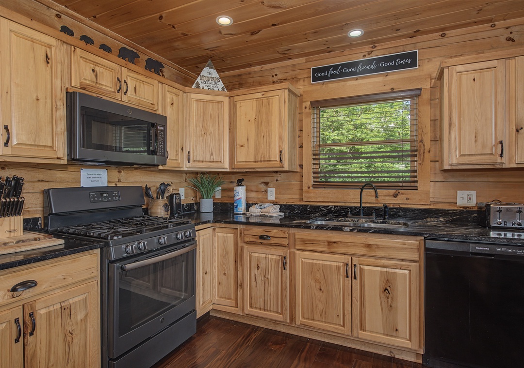 Step into your cozy cabin kitchen, where warm wood surrounds you and modern appliances make cooking a joy, with natural light streaming through trees outside.