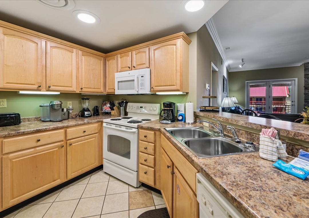 Cook your favorite meals in this fully equipped kitchen with granite counters, modern appliances, and everything you need for a comfortable stay.