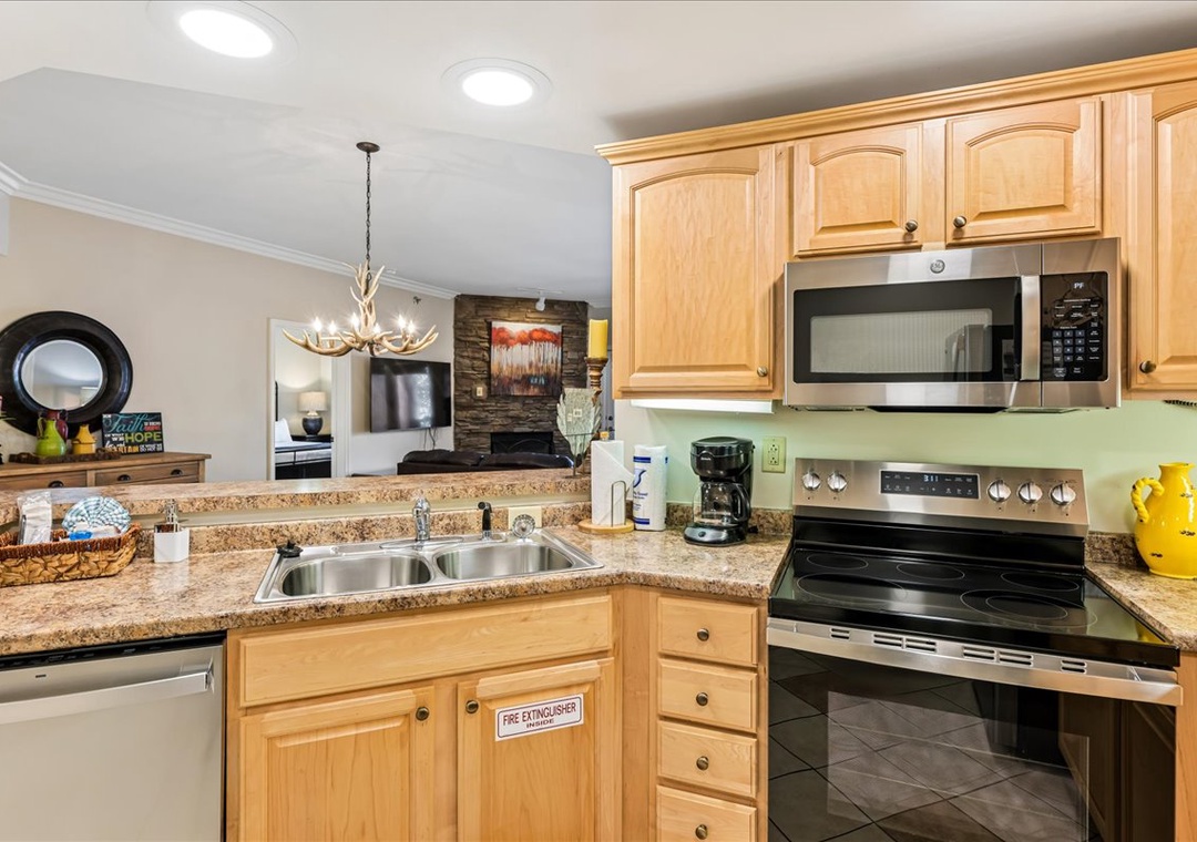 Your fully equipped kitchen awaits with granite counters, stainless appliances, and everything needed to create memorable meals during your stay.