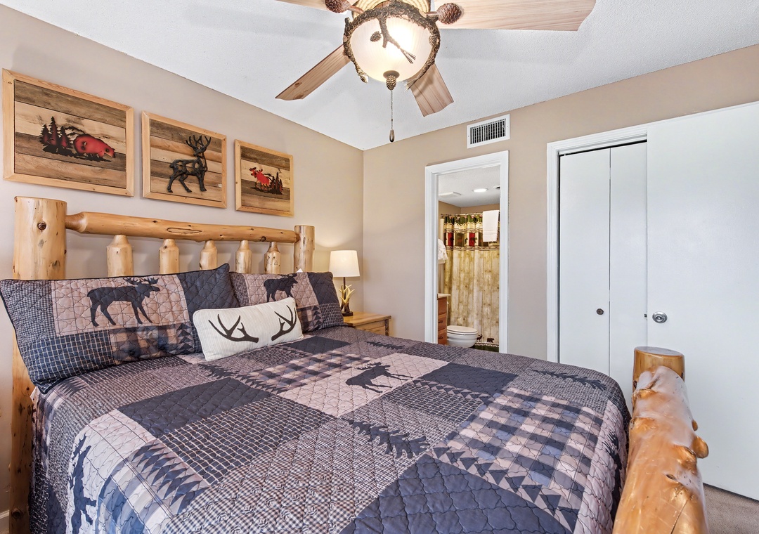 Drift into comfort beneath rustic wildlife décor and cozy log-style furnishings that make your mountain retreat feel like home.