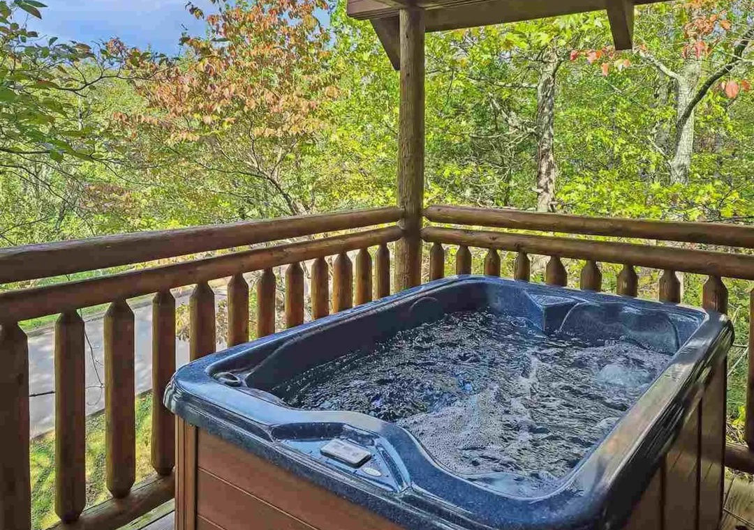 Soak in your private hot tub surrounded by lush forest canopy, where bubbling waters and nature's serenity create the perfect retreat.
