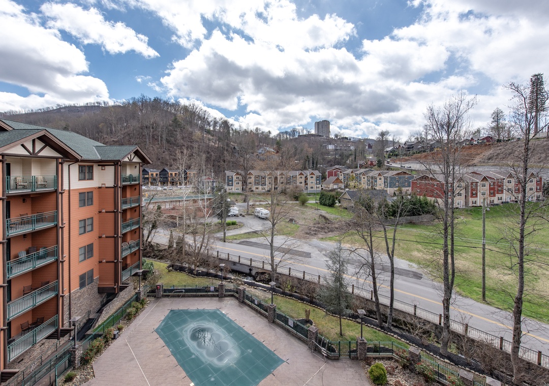 Expansive mountain valley views showcase the scenic resort community with residential areas nestled among rolling hills.