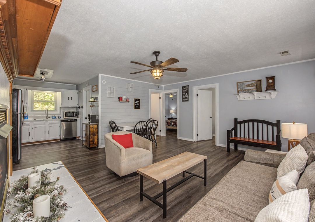 Settle into your cozy open-concept living space where modern comfort meets homey charm.