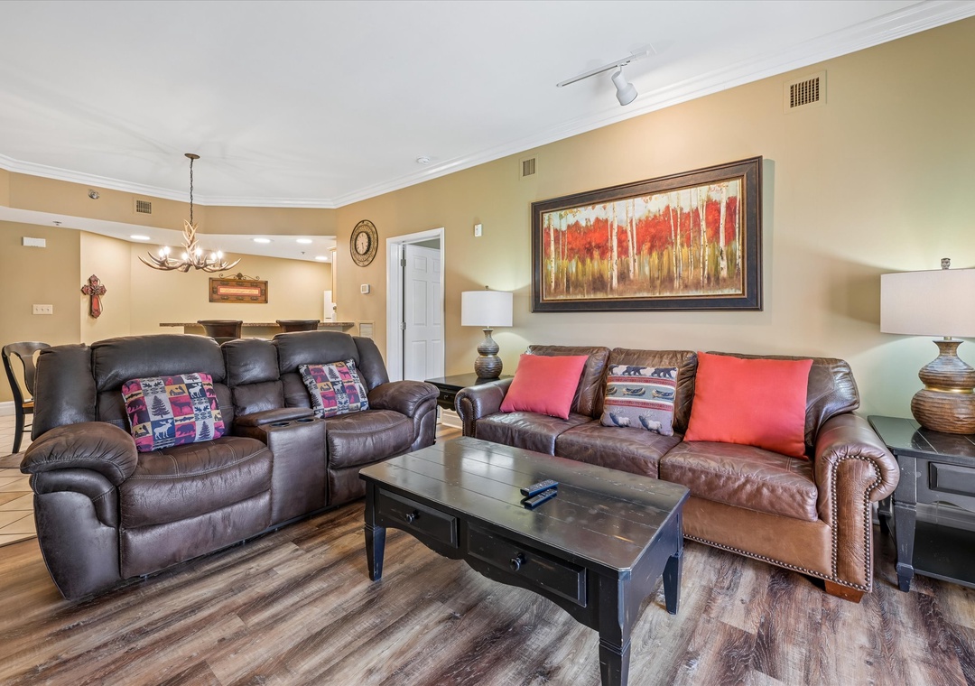 Sink into plush leather seating where warm colors and rustic touches create your perfect retreat for relaxation and conversation.