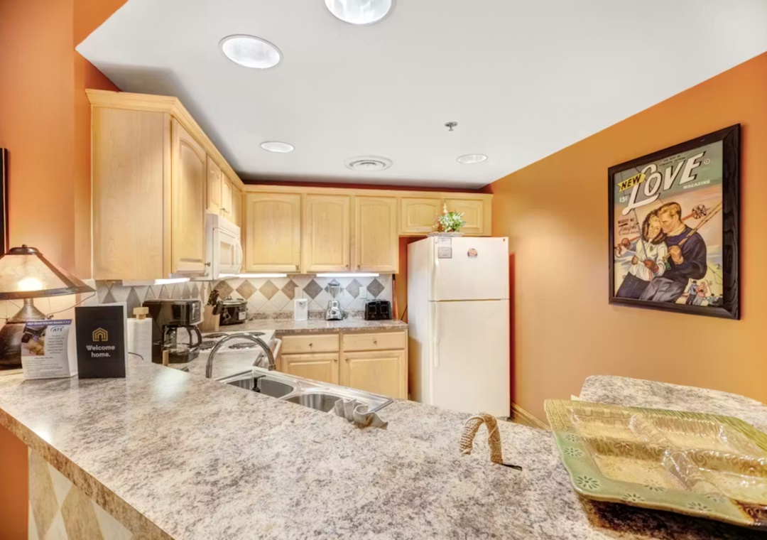 Your fully-equipped kitchen features granite countertops, modern appliances, and everything you need to prepare delicious home-cooked meals during your stay.