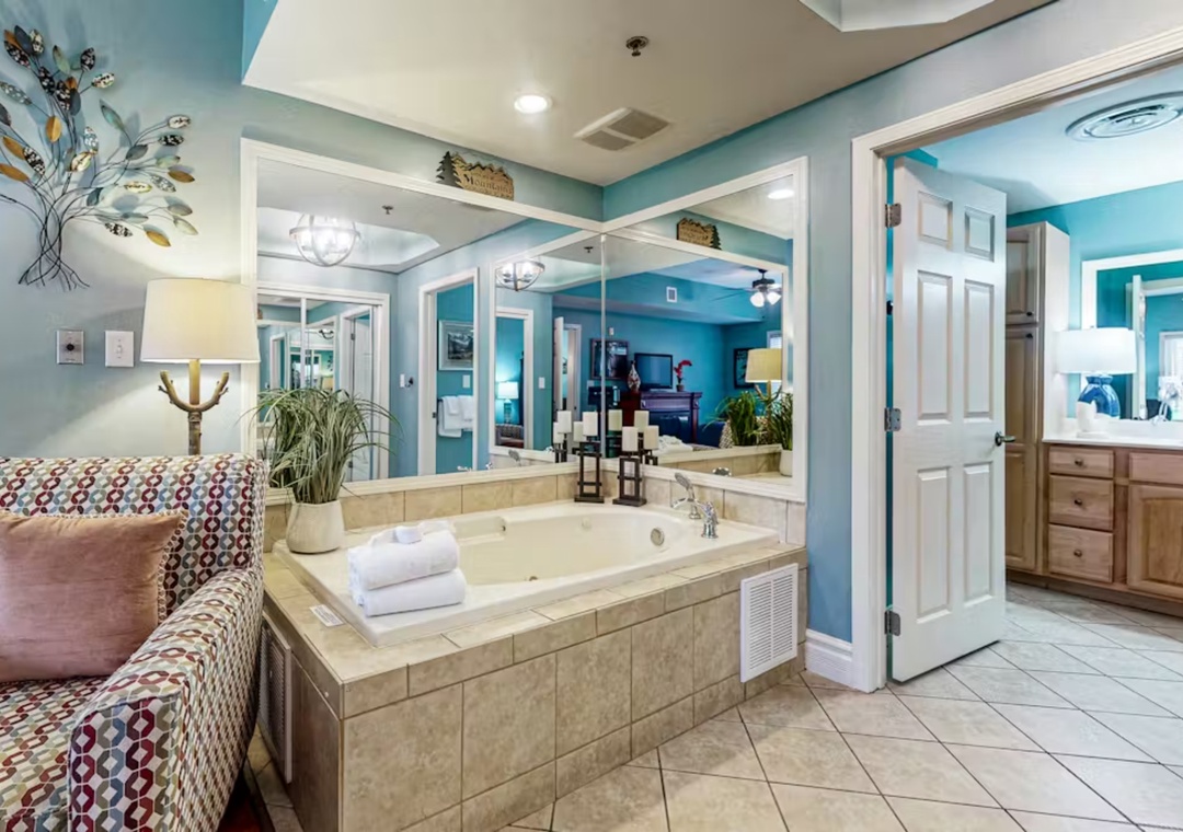 Unwind in your spa-inspired bathroom suite with a soaking tub, coastal décor, and relaxing amenities—your personal retreat.