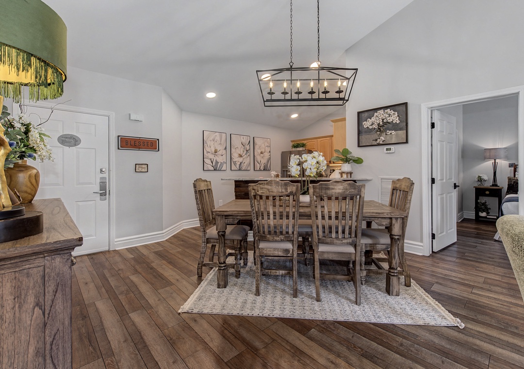 Gather around this inviting dining table where rustic charm meets modern comfort, perfect for sharing memorable meals together.