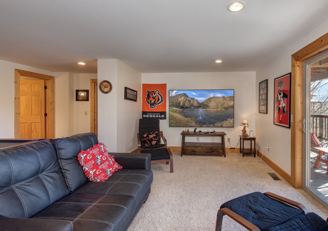 Unwind in your spacious living room with plush leather seating and big-screen entertainment, perfect for movie nights and game day celebrations.