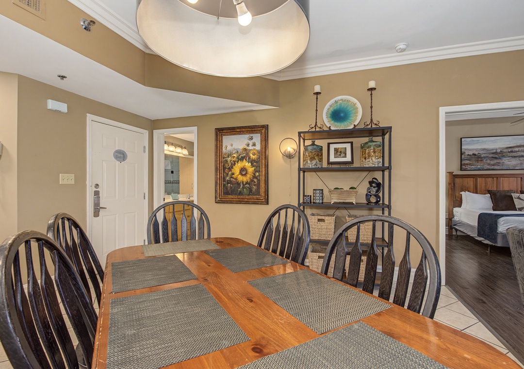 Gather around this spacious dining table where your group can share meals and create memories in this beautifully appointed space.