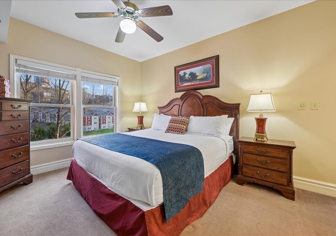 Rest peacefully in your cozy bedroom with elegant wood furnishings, crisp linens, and warm lighting creating the perfect retreat.