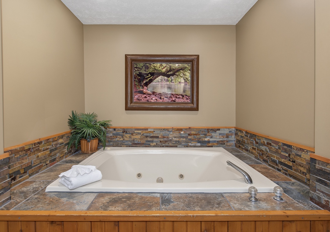 Slip into your private jetted tub, where rustic stone tile surrounds you and soft towels await. Unwind in warm, bubbling water and let the cares of the day melt away.