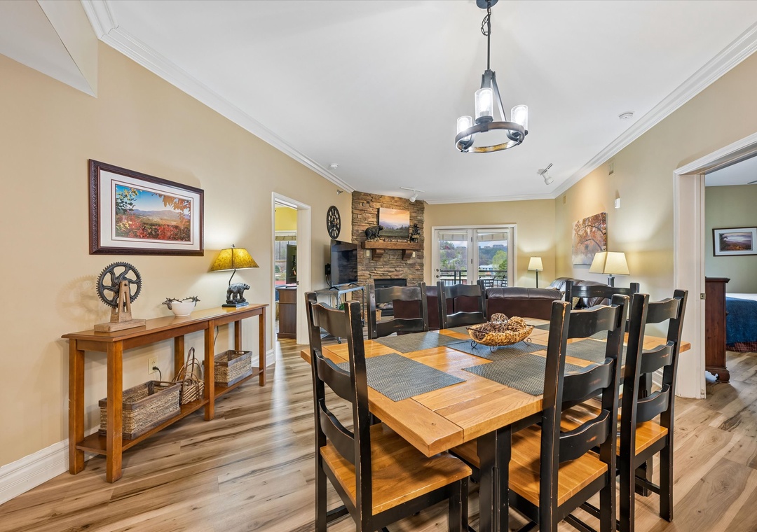 Gather around your beautiful dining table where warm wood meets cozy mountain charm, perfect for memorable meals together.