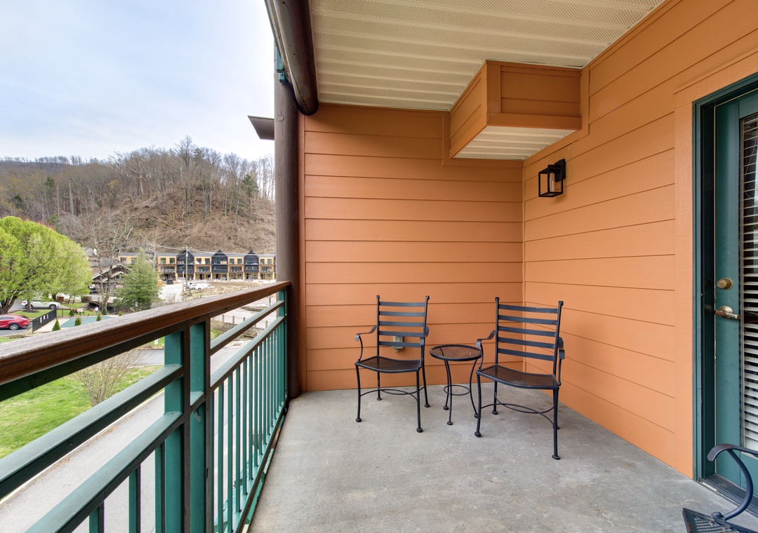 Step onto your private balcony and unwind in comfortable seating while enjoying peaceful mountain views and fresh air.