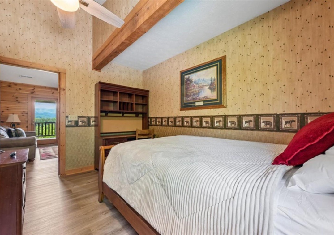 Curl up in your cozy bedroom where rustic beams and soft linens invite restful nights, with mountain views calling from just beyond the doorway.