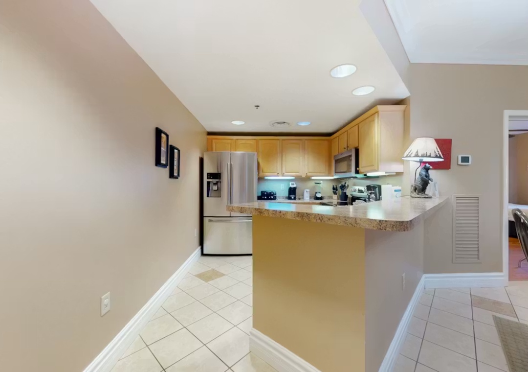 Your fully equipped kitchen awaits with granite counters, stainless appliances, and everything you need to whip up memorable meals during your stay.