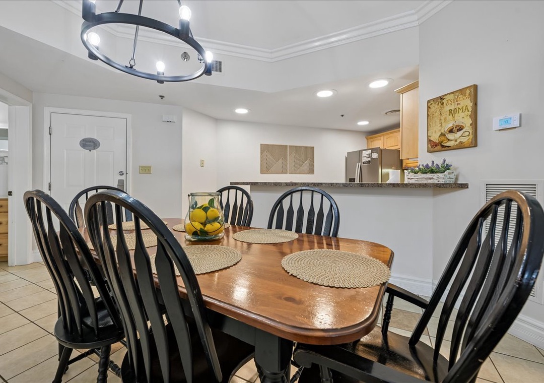 Gather around your spacious dining table for memorable meals with loved ones in this bright, welcoming space.
