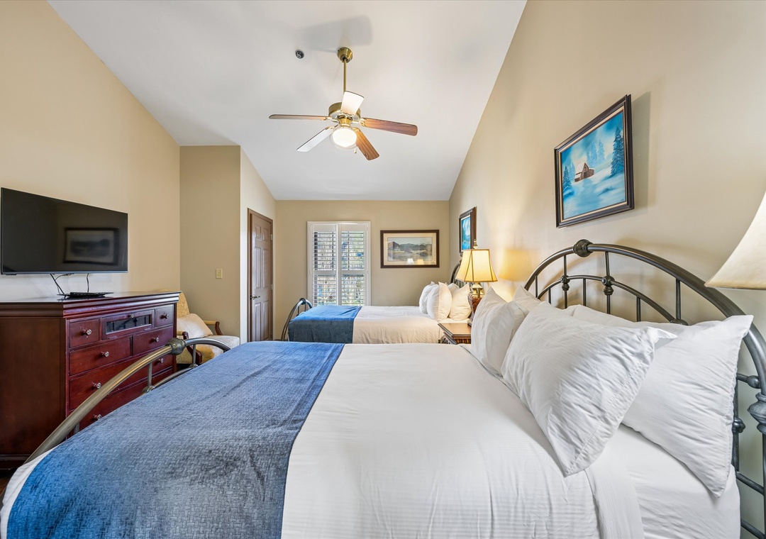 Rest peacefully in your twin bed sanctuary, where crisp linens and warm lighting create the perfect retreat after your adventures.