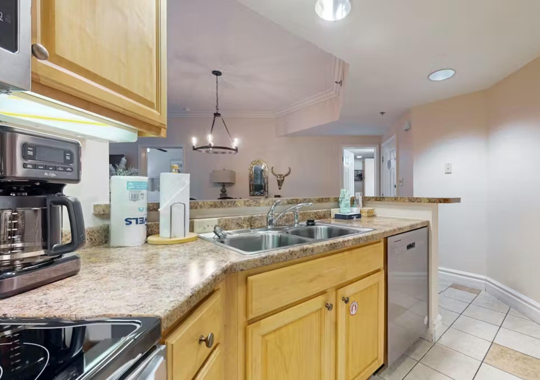 Your fully equipped kitchen makes meal preparation a breeze with granite counters and modern appliances.