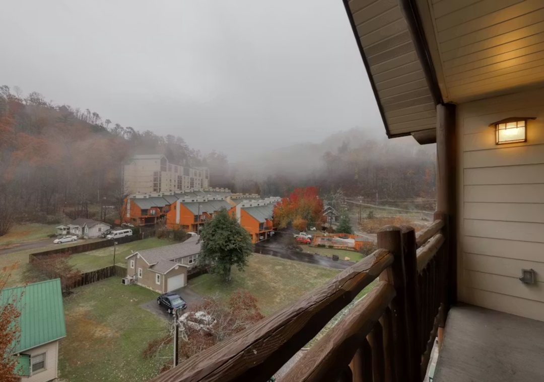 Step onto your private balcony and breathe in the crisp mountain air while taking in stunning views of autumn foliage and misty peaks.