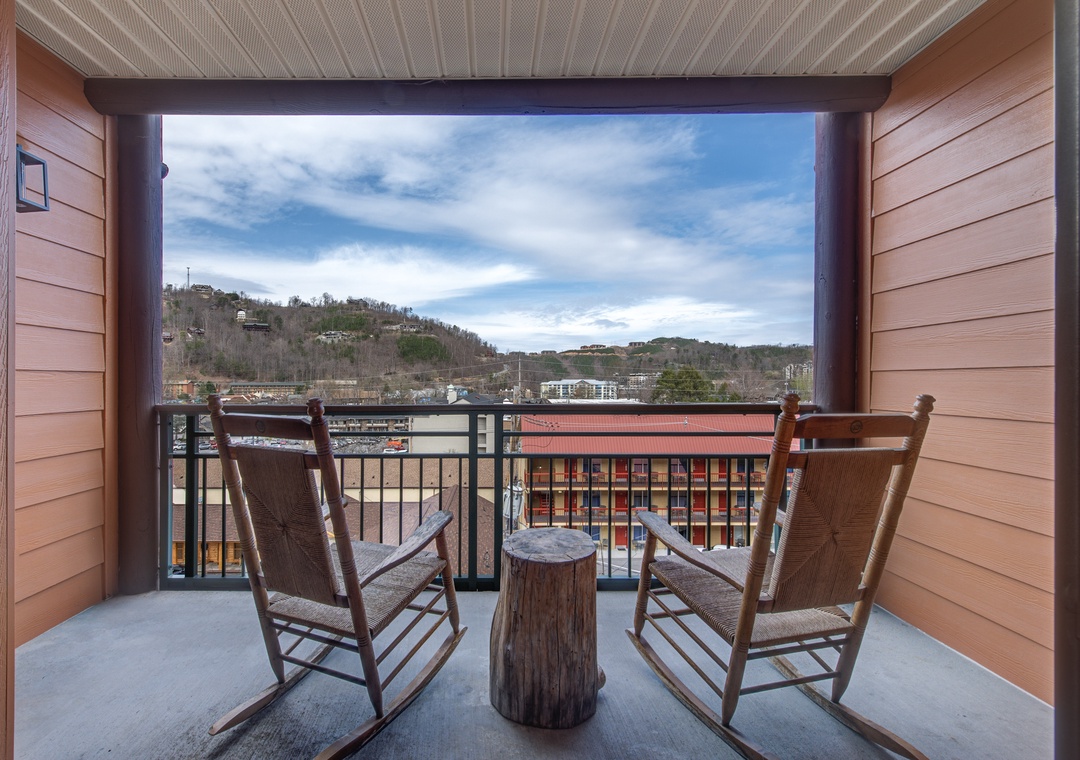 Settle into your private balcony rocking chairs and soak in the stunning hillside views stretching across the valley.