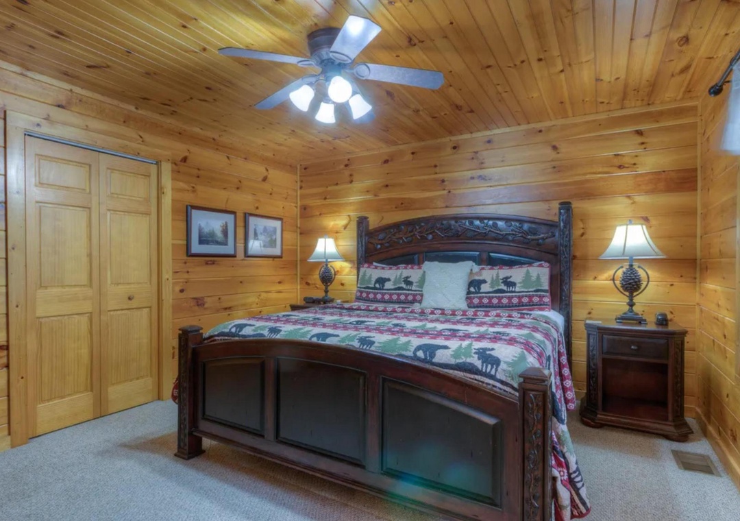 Unwind in your cozy cabin bedroom, where warm wood walls meet rustic charm. Rest on the hand-carved bed as soft lamplight creates a peaceful mountain retreat you'll never want to leave.