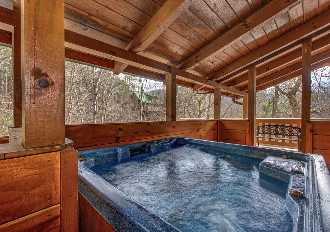 Soak away your stress in your private hot tub, surrounded by forest views and rustic charm.