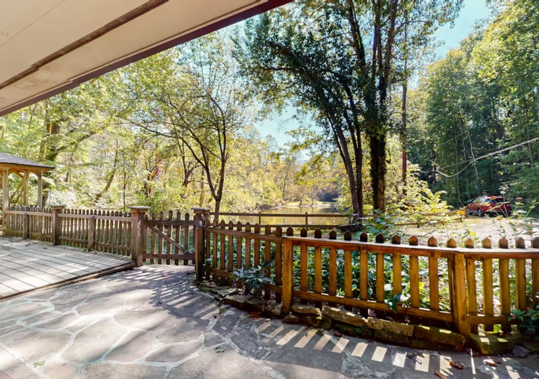 Step onto your private covered terrace and breathe in the forest air while enjoying peaceful woodland views.