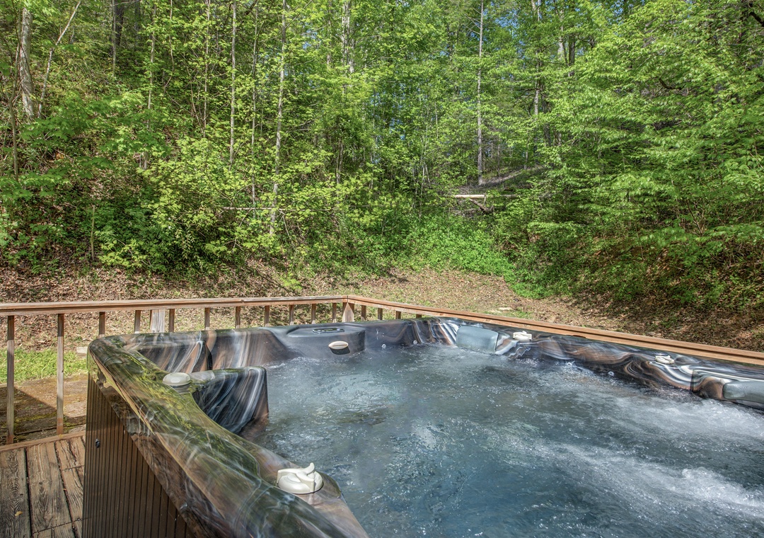 Soak in warm bubbling waters while surrounded by pristine forest. Your private hot tub offers the perfect retreat.