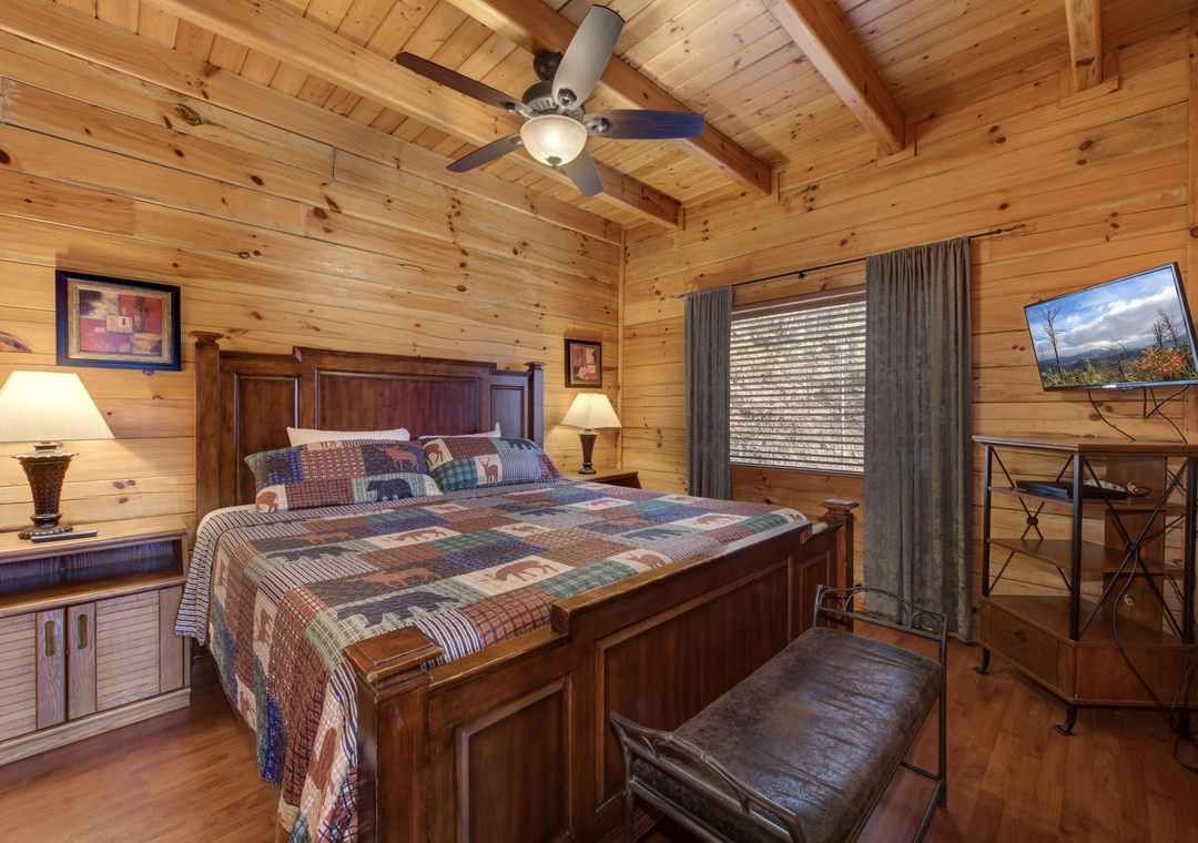 Rustic charm meets modern comfort in your cozy bedroom, where warm wood surrounds you for peaceful mountain nights.