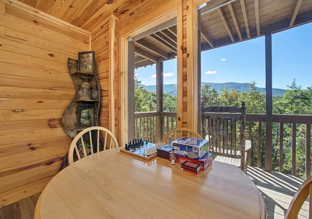 Gather around the game table and let the fresh mountain air drift in from your private covered porch. Those peaceful blue ridges stretching beyond the treetops set the perfect backdrop for friendly competition and laughter.