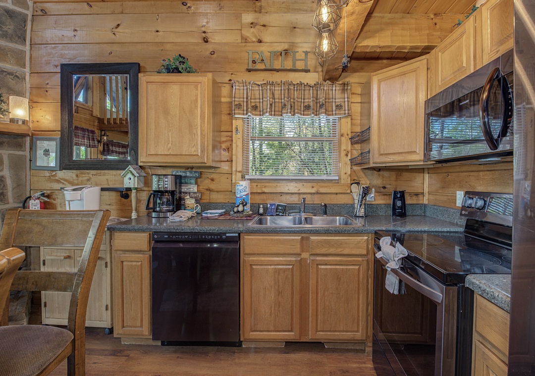 Step into your rustic kitchen with warm wood cabinets and modern appliances, perfect for preparing memorable meals during your mountain getaway.