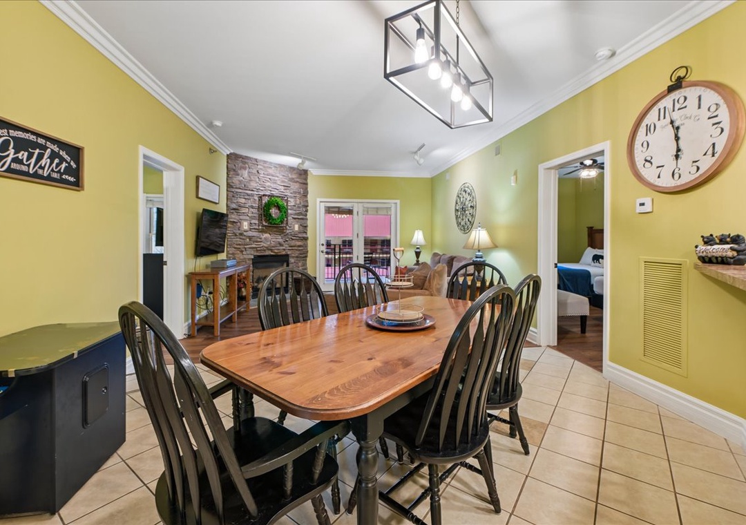 Your cozy dining room welcomes you with warm yellow walls and rustic farmhouse charm for memorable family meals.