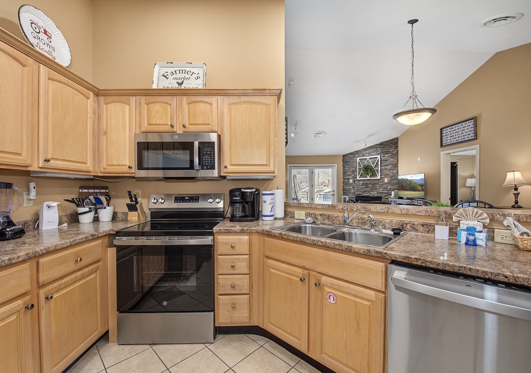 Your fully equipped kitchen features granite counters, stainless appliances, and everything needed to create memorable meals during your stay.