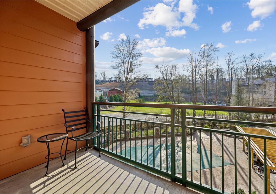 Step onto your private balcony and soak in stunning pool views while enjoying morning coffee in the fresh air.