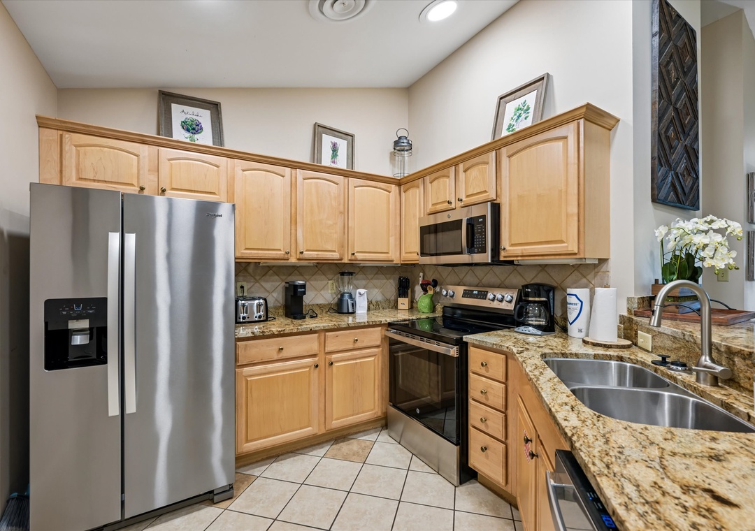 Your fully equipped kitchen features granite countertops, stainless steel appliances, and everything you need for home cooking during your stay.