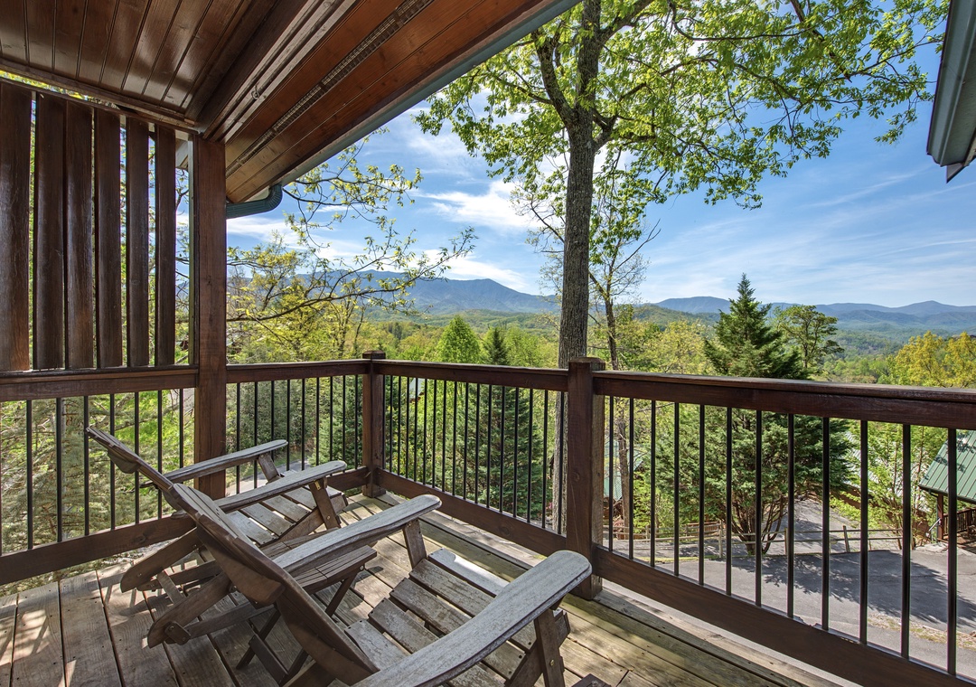 Sip your morning coffee on your private balcony while soaking in breathtaking mountain vistas through the trees.